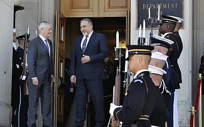 US Defense Secretary Jim Mattis, left, and Israeli Minister of Defense Avigdor Liberman enter the Pentagon for their meeting, Thursday April 26, 2018, at the Pentagon. (AP Photo/Jacquelyn Martin)