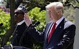 President Donald Trump speaks during a news conference with Nigerian President Muhammadu Buhari in the Rose Garden of the White House, Monday, April 30, 2018, in Washington. (AP Photo/Evan Vucci)