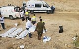 Volunteers from the ZAKA emergency response service transport the bodies of Israeli teenagers killed in a flash flood near the Dead Sea on April 26, 2018. (ZAKA)