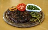 Illustration: A meal with a well-done steak. (Chen Leopold/Flash 90)