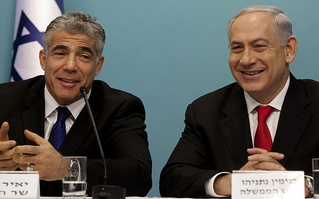 Prime Minister Benjamin Netanyahu (right) and then-finance minister Yair Lapid during a press conference on a major reform of Israel's ports, in Jerusalem on July 3, 2013. (Flash90) Prime Minister Benjamin Netanyahu (right) and then-finance minister Yair Lapid during a press conference on a major reform of Israel's ports, in Jerusalem on July 3, 2013. (Flash90)