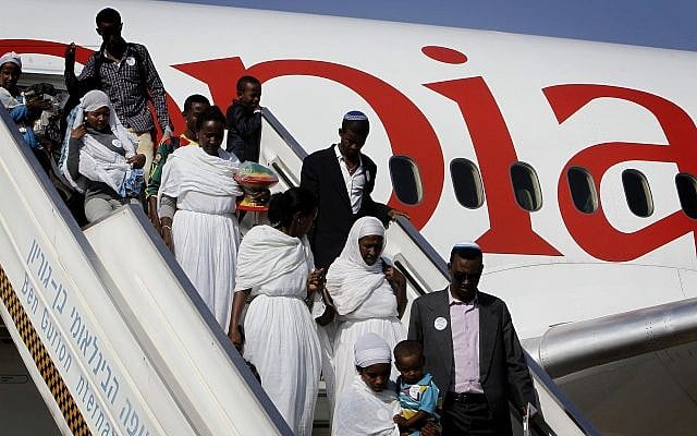 Ethiopian Falash Mura arrive at the Ben Gurion airport, outside Tel Aviv on August 28, 2013. (Miriam Alster/Flash90) Ethiopian Falash Mura arrive at the Ben Gurion airport, outside Tel Aviv on August 28, 2013. (Miriam Alster/Flash90)