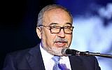 Defense Minister Avigdor Liberman speaks during a Holocaust memorial ceremony in the Southern Israeli kibbutz of Yad Mordechai, on April 12, 2018. (Flash90)