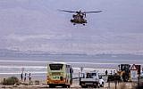 A military helicopter searches for missing students near the Dead Sea, southern Israel, April 26, 2018. (Maor Kinsbursky/Flash90)