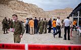 Rescue forces near the scene where 10 young Israelis were swept to their deaths in flash floods in the Tzafit riverbed, near the Dead Sea in southern Israel, on April 26, 2018. (Maor Kinsbursky/Flash90)