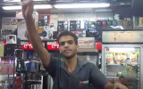 Gas station employee Jackie Dalek gives far-right activist Itamar Ben Gvir a Nazi salute. (Screen capture: JW Player)