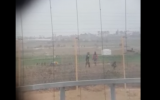 A screen capture from a video publicized on April 9, 2018 that appeared to show IDF soldiers celebrating after a sniper shoots and fells a Palestinian near the Gaza border fence. (Screen capture: YouTube)