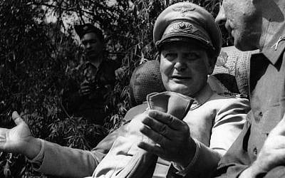 Hermann Goering speaking with a foreign journalist in his private garden in Augsburg , Germany, May 13, 1945. (Getty Images via JTA)