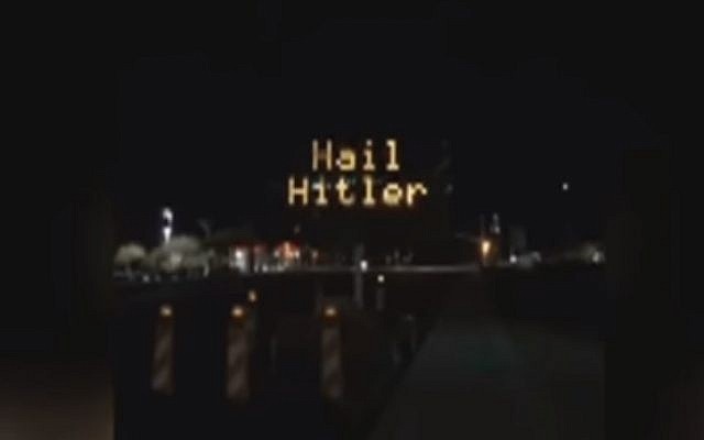 A road sign in Pinal County, Arizona, that was hacked to read "Hail Hitler," on April 27, 2018. (Screen capture: YouTube) A road sign in Pinal County, Arizona, that was hacked to read "Hail Hitler," on April 27, 2018. (Screen capture: YouTube)
