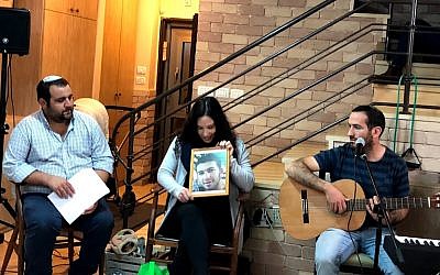 Tali Muskal (center) speaks about her brother Refanel at a Memorial Day event in Efrat on April 15, 2018. (Jacob Magid/Times of Israel)