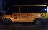Hebrew graffiti proclaiming 'We'll take our fate into our own hands' daubed on a vehicle in the West Bank Palestinian village of Ramun, April 23, 2018. (Israel Police)