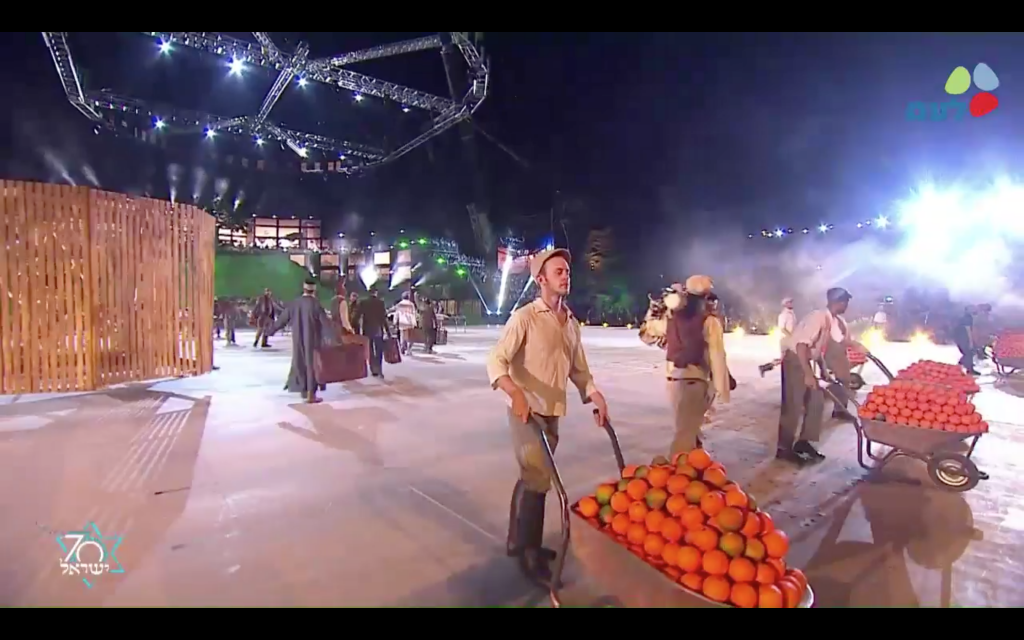 A scene depicting immigration and the pioneering early years of Israel, from Israel's opening 70th anniversary celebrations at Mount Herzl in Jerusalem, April 18, 2017 (GPO screenshot)