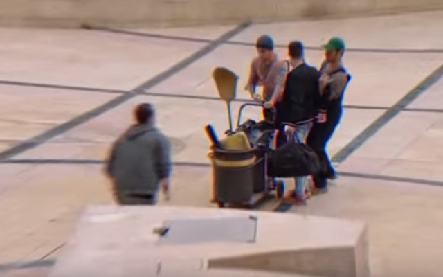 A screenshot showing undercover agents arresting a suspect from a recruitment video released by the Shin Bet security agency. (Screen capture: YouTube) A screenshot showing undercover agents arresting a suspect from a recruitment video released by the Shin Bet security agency. (Screen capture: YouTube)