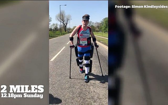 Britain's Simon Kindleysides, 34, paralyzed from the waist down, walked the London Marathon in 36 hours, with the help of the ReWalk exoskeleton, April 2018. (YouTube Screenshot) Britain's Simon Kindleysides, 34, paralyzed from the waist down, walked the London Marathon in 36 hours, with the help of the ReWalk exoskeleton, April 2018. (YouTube Screenshot)