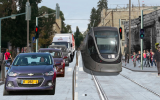 A glimpse at what Emek Refaim Street in the German Colony neighborhood of Jerusalem might look like with the light rail running through it. (Courtesy Refaim BaMoshavot)