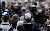 People wear kippas at a demonstration in Berlin, April 25, 2018. (AP/Markus Schreiber)