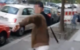An Arabic-speaking man is seen preparing to whip a kippah-wearing non-Jewish man in an anti-Semitic attack in Berlin in a video published on April 18, 2018. (Screen capture: Twitter)