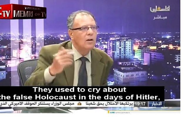 Screen capture from video of Palestinian political analyst and writer Hani Abu Zeid denying the Holocaust during an interview broadcast on Palestinian TV, April 10, 2018. (Facebook) Screen capture from video of Palestinian political analyst and writer Hani Abu Zeid denying the Holocaust during an interview broadcast on Palestinian TV, April 10, 2018. (Facebook)