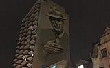 A painting of Leonard Cohen towers above Crescent Street in downtown Montreal. (Ben Harris/JTA)
