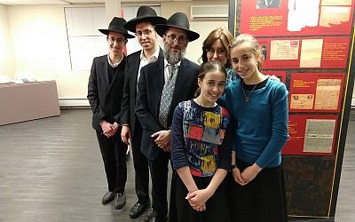 Yehuda and Breindy Gelbfish of Lakewood, New Jersey, who visited the Amud Aish Memorial Museum recently with four of their 10 children, loaned a number of items that belonged to Yehuda's father Benjamin, a Lublin Yeshiva student who fled to Vilna, Lithuania. (Jon Kalish/via JTA)