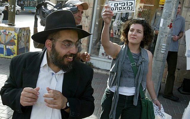 Secular Jews object to ultra-Orthodox Jews trying to stop stores, cafes and restaurants from continuing to sell bread and other leavened foods during the Passover festival in downtown Jerusalem, April 22, 2008. (Olivier Fitoussi/Flash90) Secular Jews object to ultra-Orthodox Jews trying to stop stores, cafes and restaurants from continuing to sell bread and other leavened foods during the Passover festival in downtown Jerusalem, April 22, 2008. (Olivier Fitoussi/Flash90)