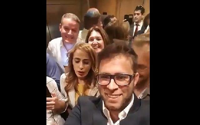 MK Oren Hazan (c) takes a selfie while trapped in an elevator with three other lawmakers and several others on April 25, 2018. (Screen capture: Twitter video) MK Oren Hazan (c) takes a selfie while trapped in an elevator with three other lawmakers and several others on April 25, 2018. (Screen capture: Twitter video)