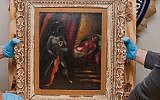 Personnel from the FBI’s Art Crime Team hold a framed work by Marc Chagall, 'Othello and Desdemona,' prior to its return to the owners’ estate nearly 30 years after it was stolen. (FBI)