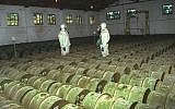 In this May 20, 2000 file photo, two Russian soldiers make a routine check of metal containers with toxic agents at the Shikhany chemical weapons storage site in the town of Gorny, 124 miles (200 kms) south of the Volga River city of Saratov, Russia.  (AP Photo, File)
