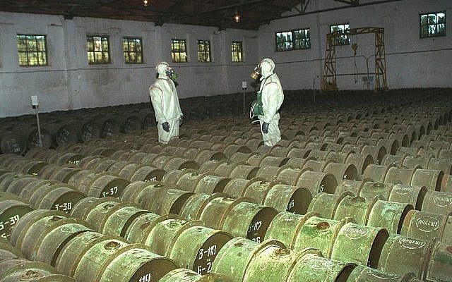 In this May 20, 2000 file photo, two Russian soldiers make a routine check of metal containers with toxic agents at the Shikhany chemical weapons storage site in the town of Gorny, 124 miles (200 kms) south of the Volga River city of Saratov, Russia. (AP Photo, File) In this May 20, 2000 file photo, two Russian soldiers make a routine check of metal containers with toxic agents at the Shikhany chemical weapons storage site in the town of Gorny, 124 miles (200 kms) south of the Volga River city of Saratov, Russia. (AP Photo, File)