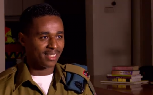 Damas Pakada, the Ethiopian-born soldier who sparked national riots when footage emerged of him being beaten by police in 2015, in an interview with Hadashot television aired Saturday, April 21, 2018. (Screen shot) Damas Pakada, the Ethiopian-born soldier who sparked national riots when footage emerged of him being beaten by police in 2015, in an interview with Hadashot television aired Saturday, April 21, 2018. (Screen shot)