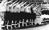 Before a record crowd of more than 100,000 people who filled Berlin's Olympic stadium. the English football team gave the Nazi salute in this May 14th, 1938, file photo. England beat Germany 6-3. (AP PHOTO).
