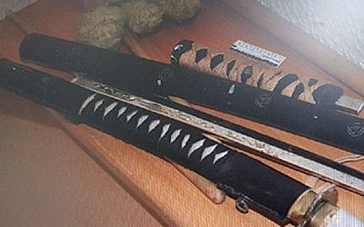 Swords with which Yevgeny Semersky is accused of killing his father in law on March 8, 2018. (Israel Police)