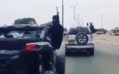 Video screen shot of Bedouin men shooting M16 weapons in a wedding celebration, April 20, 2018.