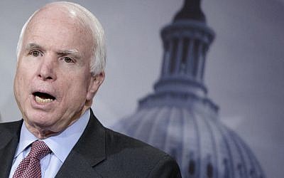 US Senator John McCain speaks during a press conference on Capitol Hill in Washington, DC, January 13, 2015 ( AFP PHOTO / BRENDAN SMIALOWSKI)