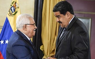 Venezuelan President Nicolas Maduro greets Palestinian Authority President Mahmoud Abbas, during a meeting at the Miraflores presidential palace in Caracas on May 7, 2018. (AFP PHOTO / JUAN BARRETO)