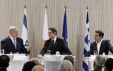 Prime Minister Benjamin Netanyahu (L) speaks during a press conference with Cypriot President Nicos Anastasiades (C) and Greek Prime Minister Alexis Tsipras (R), at the Presidential Palace in the Cypriot capital Nicosia on May 8, 2018. (YIANNIS KOURTOGLOU/AFP)