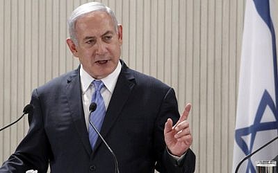 Israeli Prime Minister Benjamin Netanyahu speaks during a press conference with the Cypriot President and Greek Prime Minister at the Presidential Palace in the Cypriot capital Nicosia on May 8, 2018. (AFP/POOL /YIANNIS KOURTOGLOU)