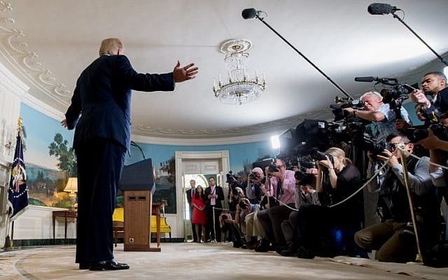 US President Donald Trump leaves after announcing his decision about the nuclear deal with Iran during a speech from the Diplomatic Reception Room at the White House in Washington, DC, May 8, 2018. (AFP PHOTO / SAUL LOEB) US President Donald Trump leaves after announcing his decision about the nuclear deal with Iran during a speech from the Diplomatic Reception Room at the White House in Washington, DC, May 8, 2018. (AFP PHOTO / SAUL LOEB)