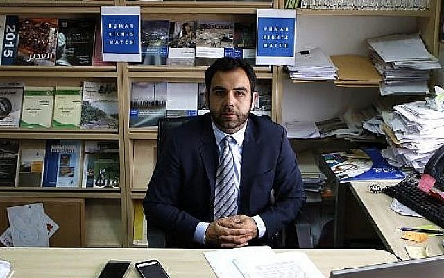 Human Rights Watch's Israel and Palestine director Omar Shakir, a US citizen, sits in his office in the West Bank city of Ramallah, May 9, 2018. (Abbas Momani/AFP) Human Rights Watch's Israel and Palestine director Omar Shakir, a US citizen, sits in his office in the West Bank city of Ramallah, May 9, 2018. (Abbas Momani/AFP)