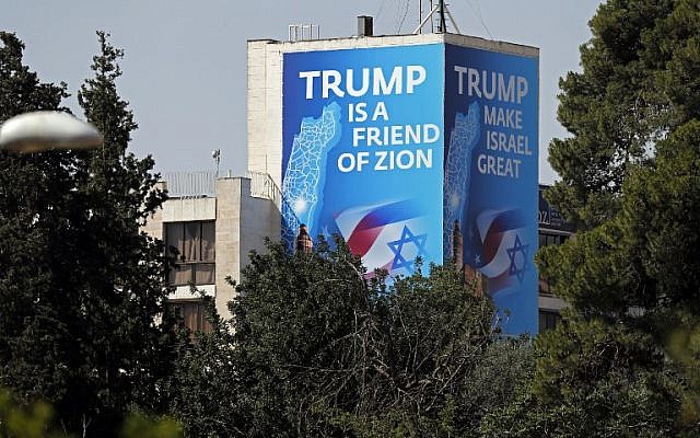 A poster praising US President Donald Trump covers an outside section of the "Diplomat Hotel", adjacent to the US consulate in Jerusalem which will host the new US embassy, on May 11, 2018. (AFP Photo/Thomas Coex) A poster praising US President Donald Trump covers an outside section of the "Diplomat Hotel", adjacent to the US consulate in Jerusalem which will host the new US embassy, on May 11, 2018. (AFP Photo/Thomas Coex)