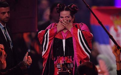 Israel's singer Netta Barzilai aka Netta reacts after winning the final of the 63rd edition of the Eurovision Song Contest 2018 at the Altice Arena in Lisbon, on May 12, 2018. (AFP/Francisco LEONG)