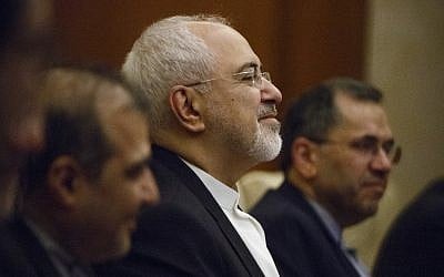 Iranian Foreign Minister Mohammad Javad Zarif holds talks with Chinese State Councillor and Foreign Minister Wang Yi (not pictured) at the Diaoyutai state guesthouse in Beijing on May 13, 2018. (AFP Photo/Pool/Thomas Peter)