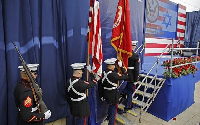 Members of the US honor guard carry flags onto the stage during the opening of the US Embassy in Jerusalem, on May 14, 2018. (Menahem KAHANA/AFP) Members of the US honor guard carry flags onto the stage during the opening of the US Embassy in Jerusalem, on May 14, 2018. (Menahem KAHANA/AFP)