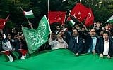 FILE: Protesters chant slogans as they wave Hamas, Turkish and Palestinian flags outside the residence of the Israeli ambassador in Ankara, on May 14, 2018, during a demonstration against the opening of the new US embassy in Jerusalem. (AFP Photo/Adem Altan)