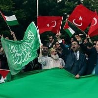 FILE: Protesters chant slogans as they wave Hamas, Turkish and Palestinian flags outside the residence of the Israeli ambassador in Ankara, on May 14, 2018, during a demonstration against the opening of the new US embassy in Jerusalem. (AFP Photo/Adem Altan)