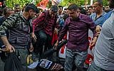 Protesters kick an effigy of Israel's Prime Minister Benjamin Netanyahu as they shout slogans in Diyarbakir, Turkey, on May 15, 2018. (AFP  / ILYAS AKENGIN)