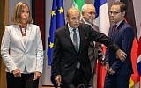 Iran's Foreign Minister Mohammad Javad Zarif (2nd R), France's Foreign Minister Jean-Yves Le Drian (2nd L), Germany Foreign Minister Heiko Maas (R), EU High Representative for Foreign Affairs Federica Mogherini and Britain's Foreign Secretary arrive for a meeting of EU/E3 with Iran at the EU headquarters in Brussels on May 15, 2018. (AFP Photo/Pool/Olivier Matthys)