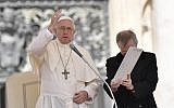 Pope Francis blesses the crowd at the end of a weekly general audience at St. Peter's square on May 16, 2018, in Vatican. (AFP PHOTO / Andreas SOLARO)