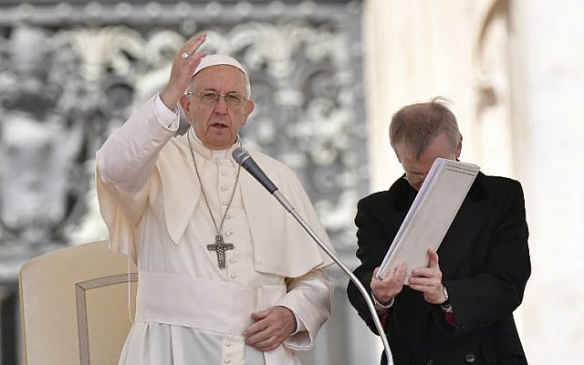 Pope Francis blesses the crowd at the end of a weekly general audience at St. Peter's square on May 16, 2018, in Vatican. (AFP PHOTO / Andreas SOLARO) Pope Francis blesses the crowd at the end of a weekly general audience at St. Peter's square on May 16, 2018, in Vatican. (AFP PHOTO / Andreas SOLARO)