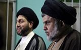 Iraqi Shiite Muslim leader and head of Hikma party Ammar al-Hakim (L) and Shiite cleric Muqtada al-Sadr meet in the Iraqi holy city of Najaf on May 17, 2018. ( AFP PHOTO / Haidar HAMDANI)